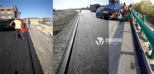 瀝青砂攔水帶滑模機(jī)施工現(xiàn)場(chǎng)